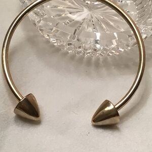 Goldtone Arrow Bangle Bracelet